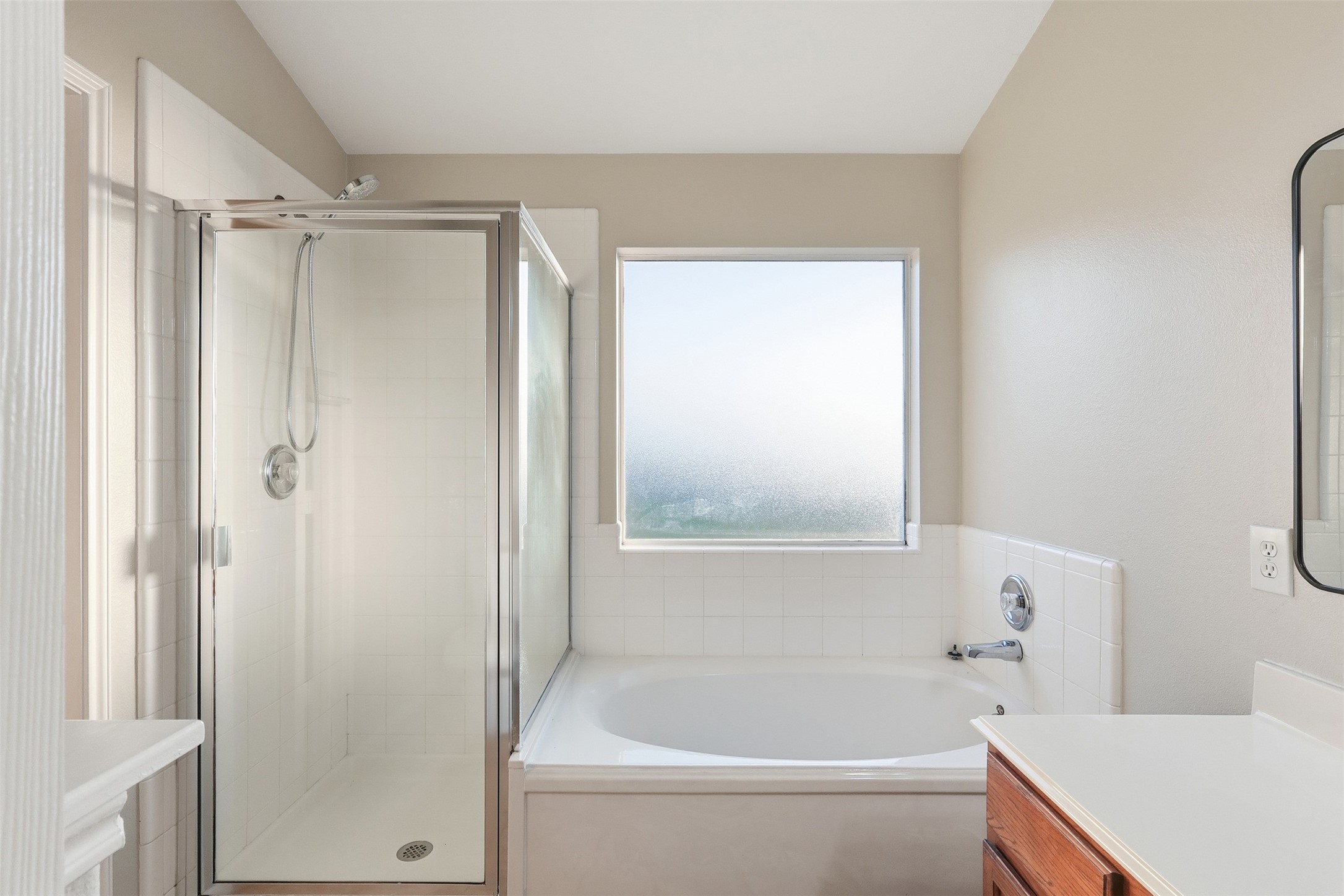 6006 Wilcox Point Drive Spring, TX 77388 - Photo 23 of 30 a bathroom with a shower a bathtub and a shower