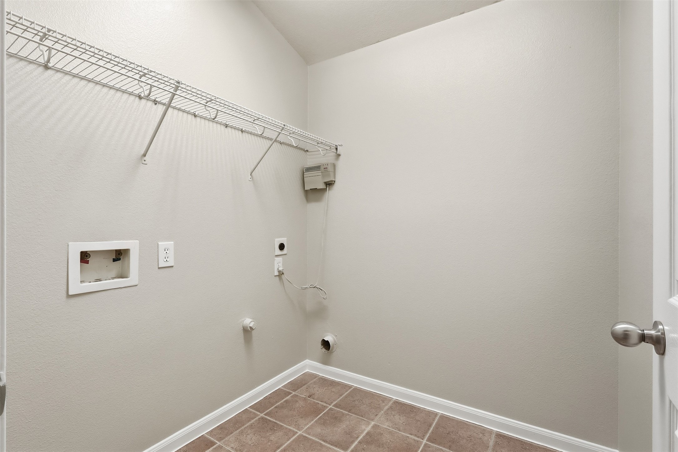 6006 Wilcox Point Drive Spring, TX 77388 - Photo 25 of 30 a view of a room with racks on the wall