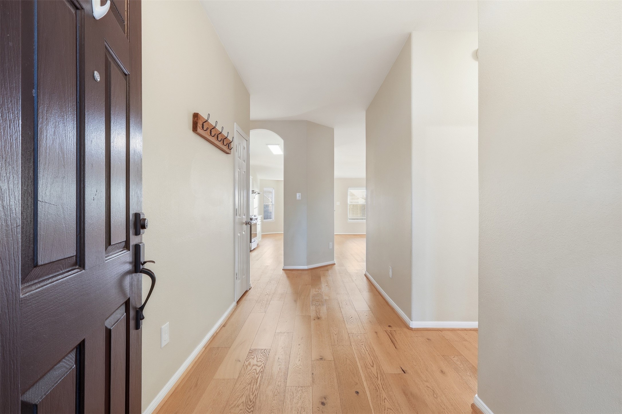 6006 Wilcox Point Drive Spring, TX 77388 - Photo 4 of 30 a view of a hallway with wooden floor