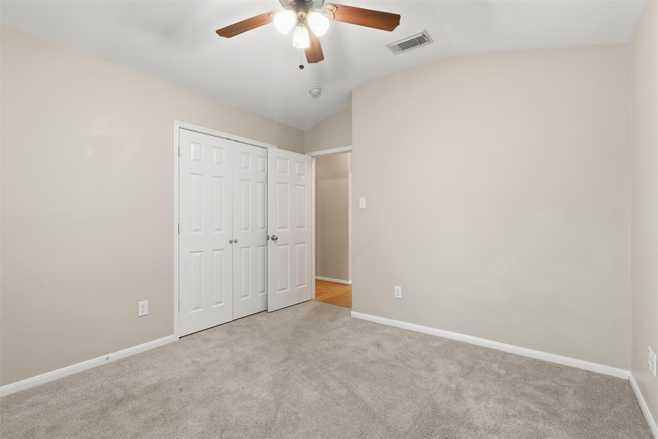 6006 Wilcox Point Drive Spring, TX 77388 - Photo 6 of 30 an empty room with a chandelier fan