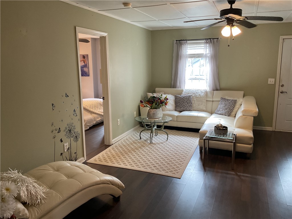 229 Cub Cove Drive Walhalla, SC 29691 - Photo 20 of 50 This inviting living space features rich wood flooring, offering comfort and style.