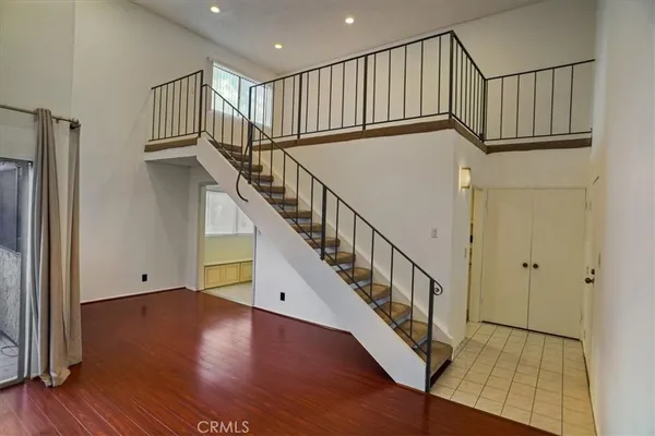 a view of entryway with wooden floor
