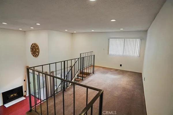 a view of hallway with stairs
