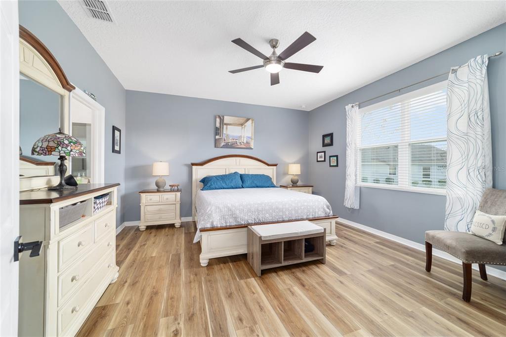 7765 Southwest 80th Pl Road Ocala, FL 34476 - Photo 23 of 37 a living room with a bed furniture and a window