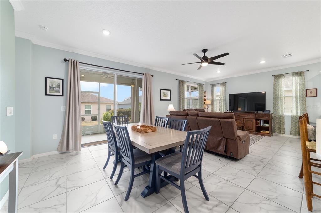 7765 Southwest 80th Pl Road Ocala, FL 34476 - Photo 9 of 37 a view of a livingroom with furniture and a window