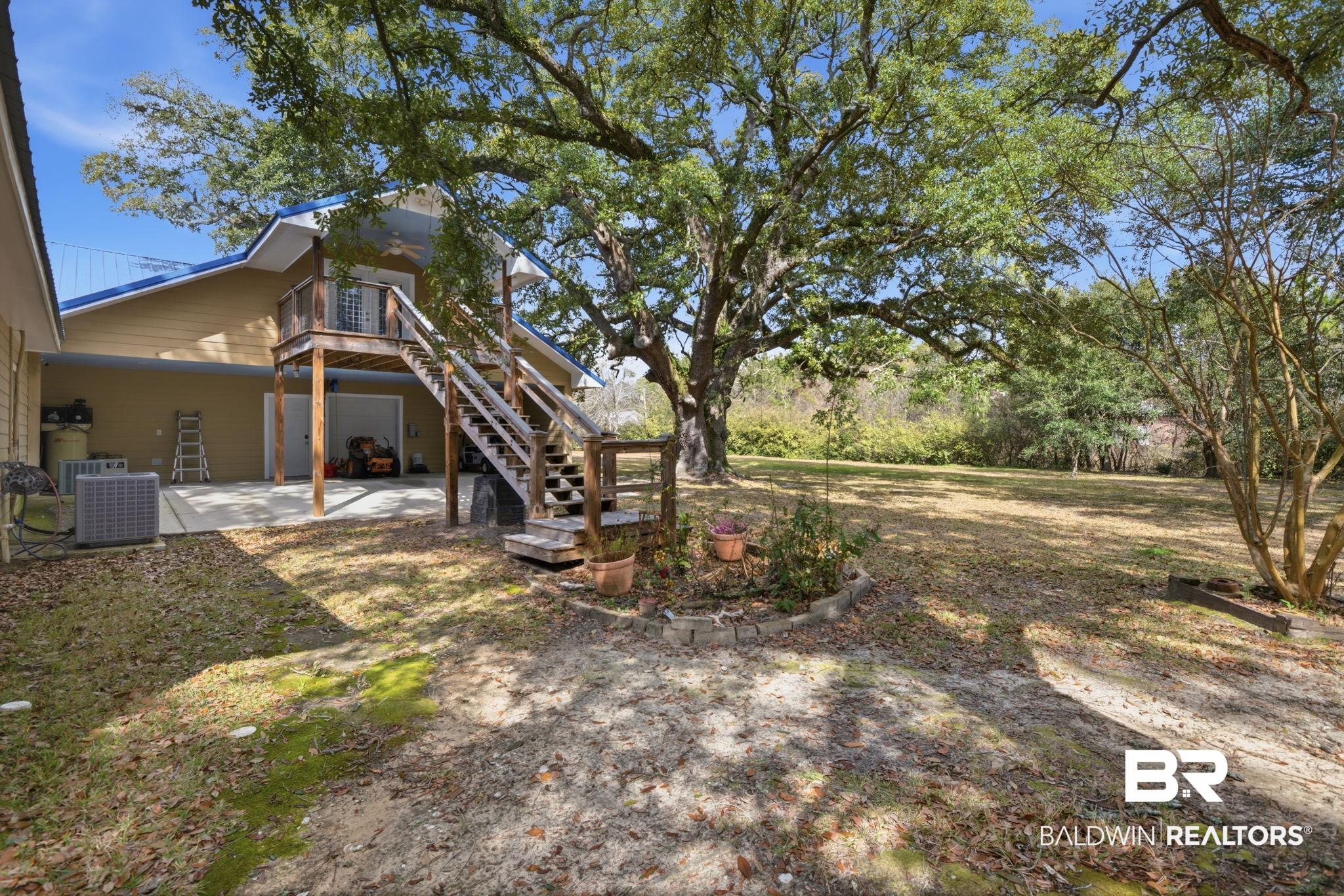 15025 Bellingrath Road Coden, AL 36523 - Photo 26 of 79 STAIRS LEADING TO GUEST SUITE