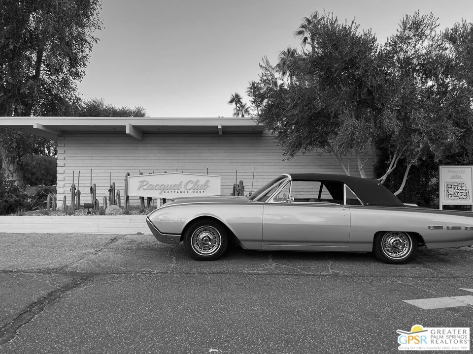 360 Cabrillo Road, Unit 220 Palm Springs, CA 92262 - Photo 1 of 57 a view of a car parked in garage