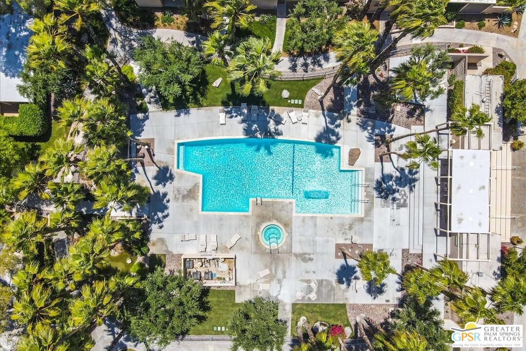 360 Cabrillo Road, Unit 220 Palm Springs, CA 92262 - Photo 2 of 57 an aerial view of a house with a yard and garden