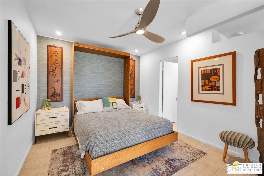 360 Cabrillo Road, Unit 220 Palm Springs, CA 92262 - Photo 24 of 57 a bedroom with a bed and a window