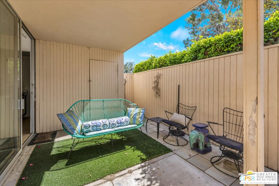 360 Cabrillo Road, Unit 220 Palm Springs, CA 92262 - Photo 32 of 57 a view of two chairs in patio