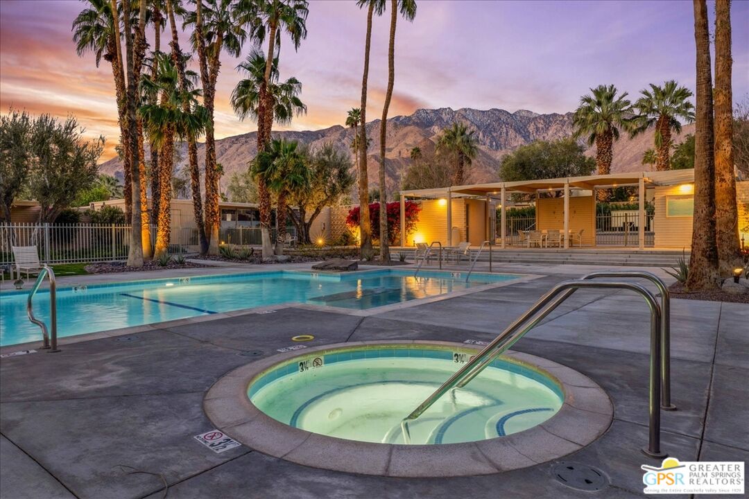 360 Cabrillo Road, Unit 220 Palm Springs, CA 92262 - Photo 44 of 57 a swimming pool with outdoor seating yard and barbeque oven