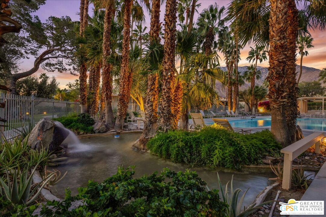 360 Cabrillo Road, Unit 220 Palm Springs, CA 92262 - Photo 47 of 57 a backyard of a house with lots of green space