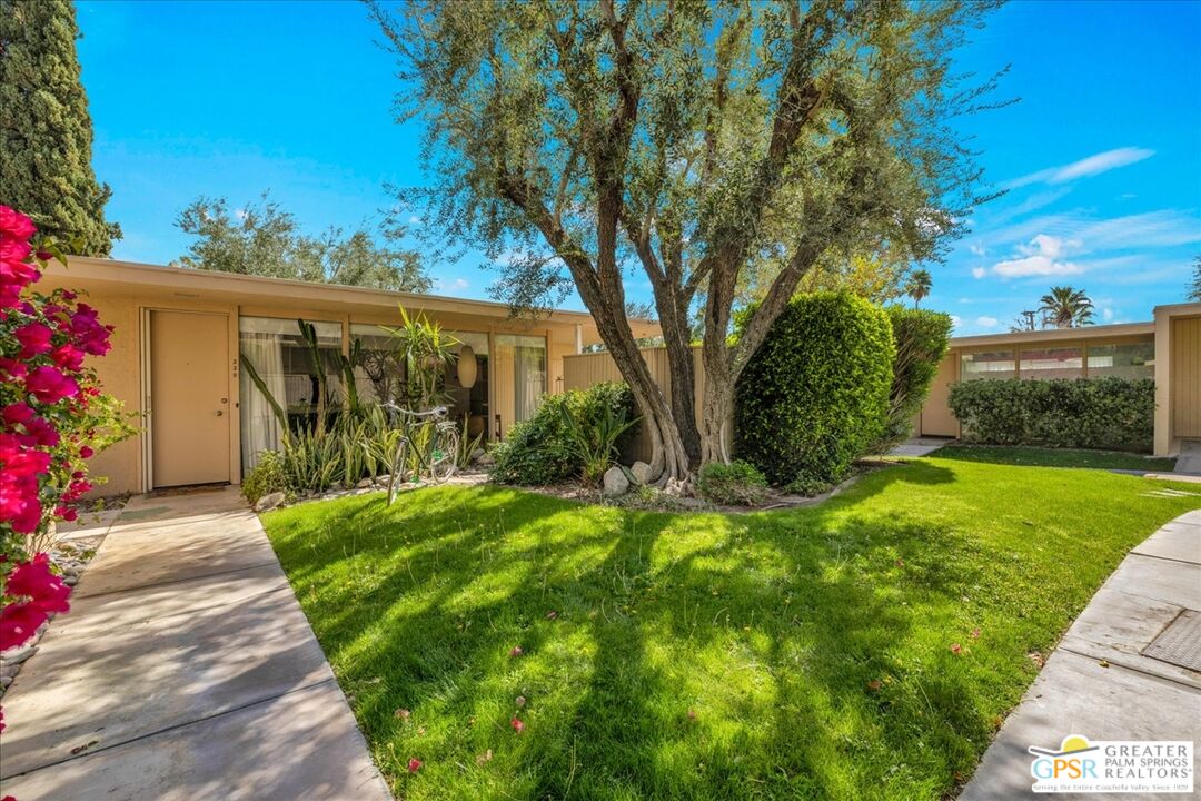 360 Cabrillo Road, Unit 220 Palm Springs, CA 92262 - Photo 5 of 57 a front view of house with garden