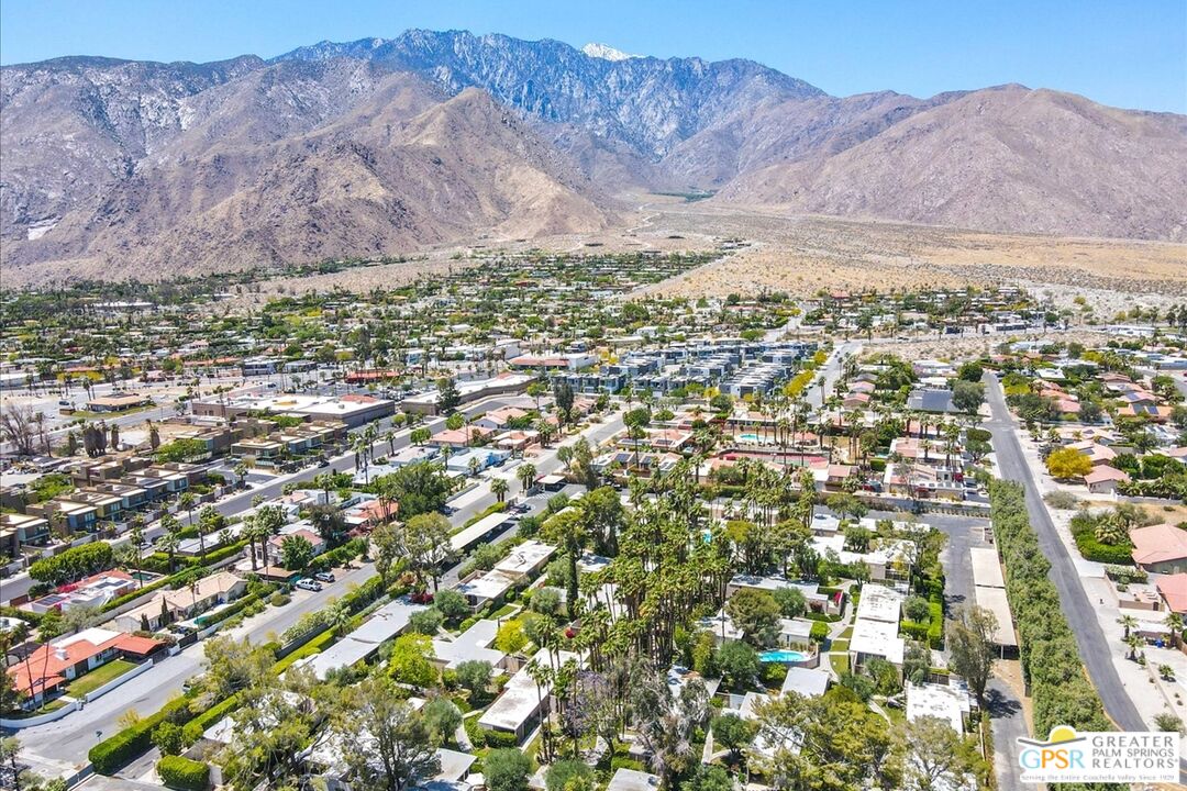 360 Cabrillo Road, Unit 220 Palm Springs, CA 92262 - Photo 56 of 57 a view of a dry yard with mountains in the background