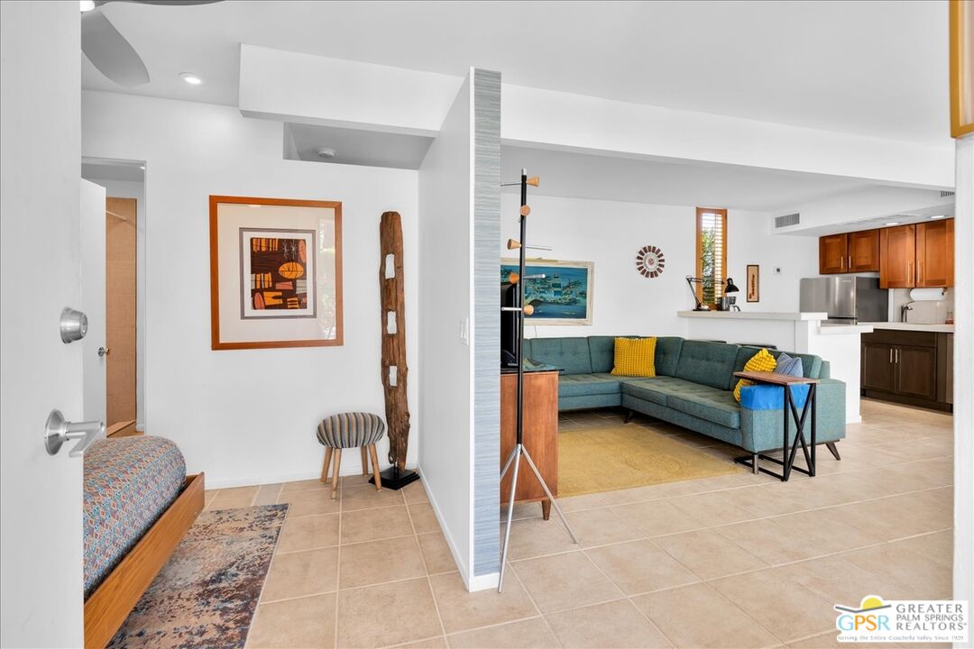 360 Cabrillo Road, Unit 220 Palm Springs, CA 92262 - Photo 10 of 57 a living room with furniture and a couch