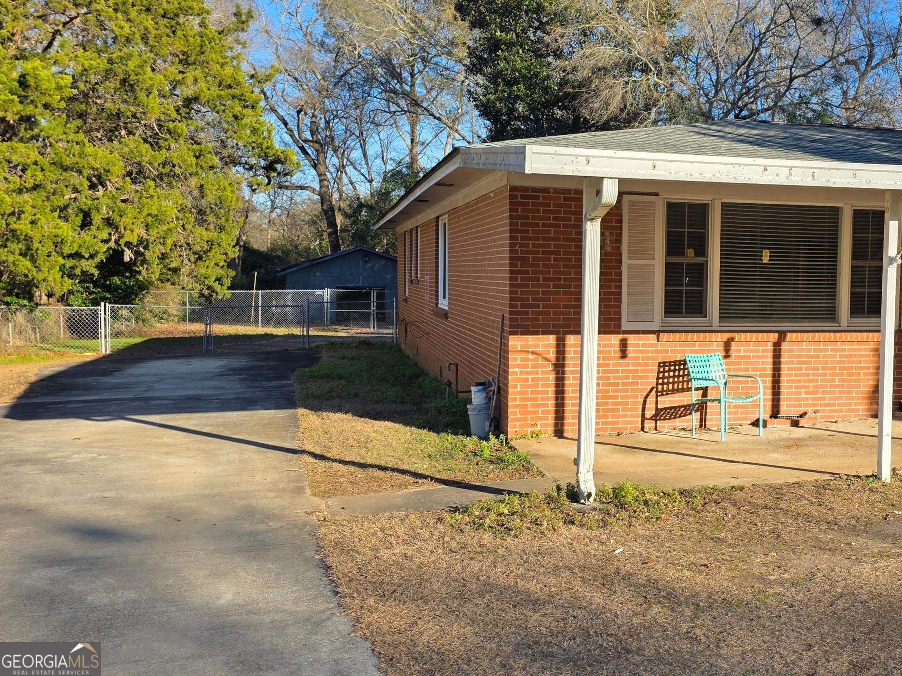 110 Lee Street Centerville, GA 31028 - Photo 2 of 18 a front view of a house with garage