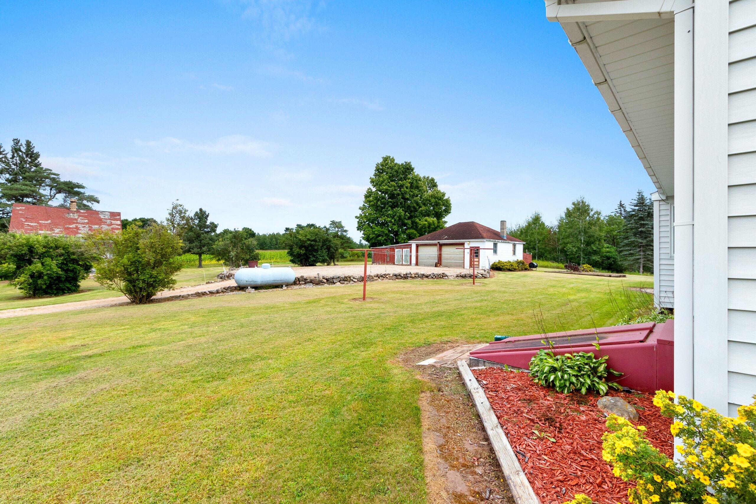 W7478 County Road 358 Daggett, MI 49821 - Photo 36 of 70 Back Yard and 2nd garage