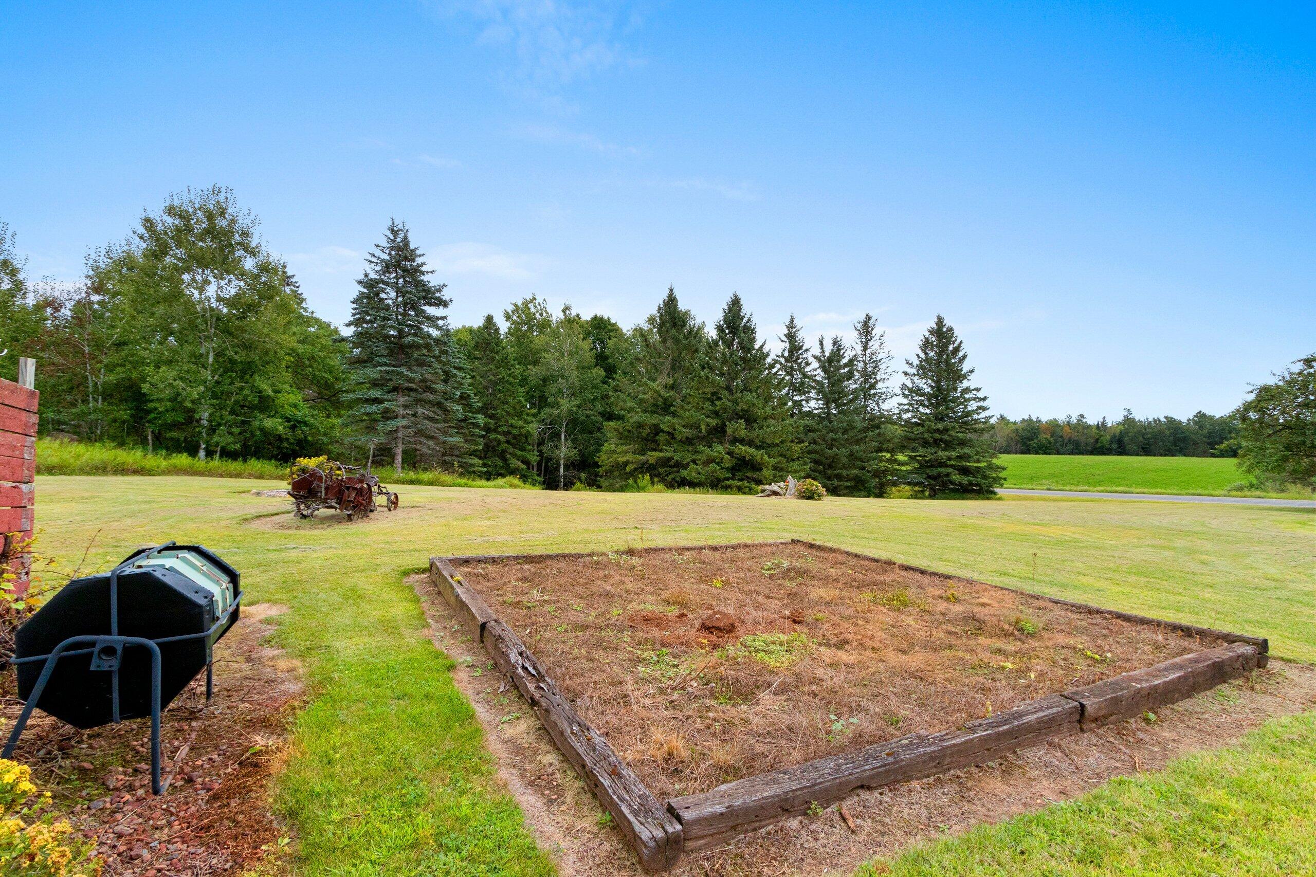 W7478 County Road 358 Daggett, MI 49821 - Photo 37 of 70 Side yard & Garden area