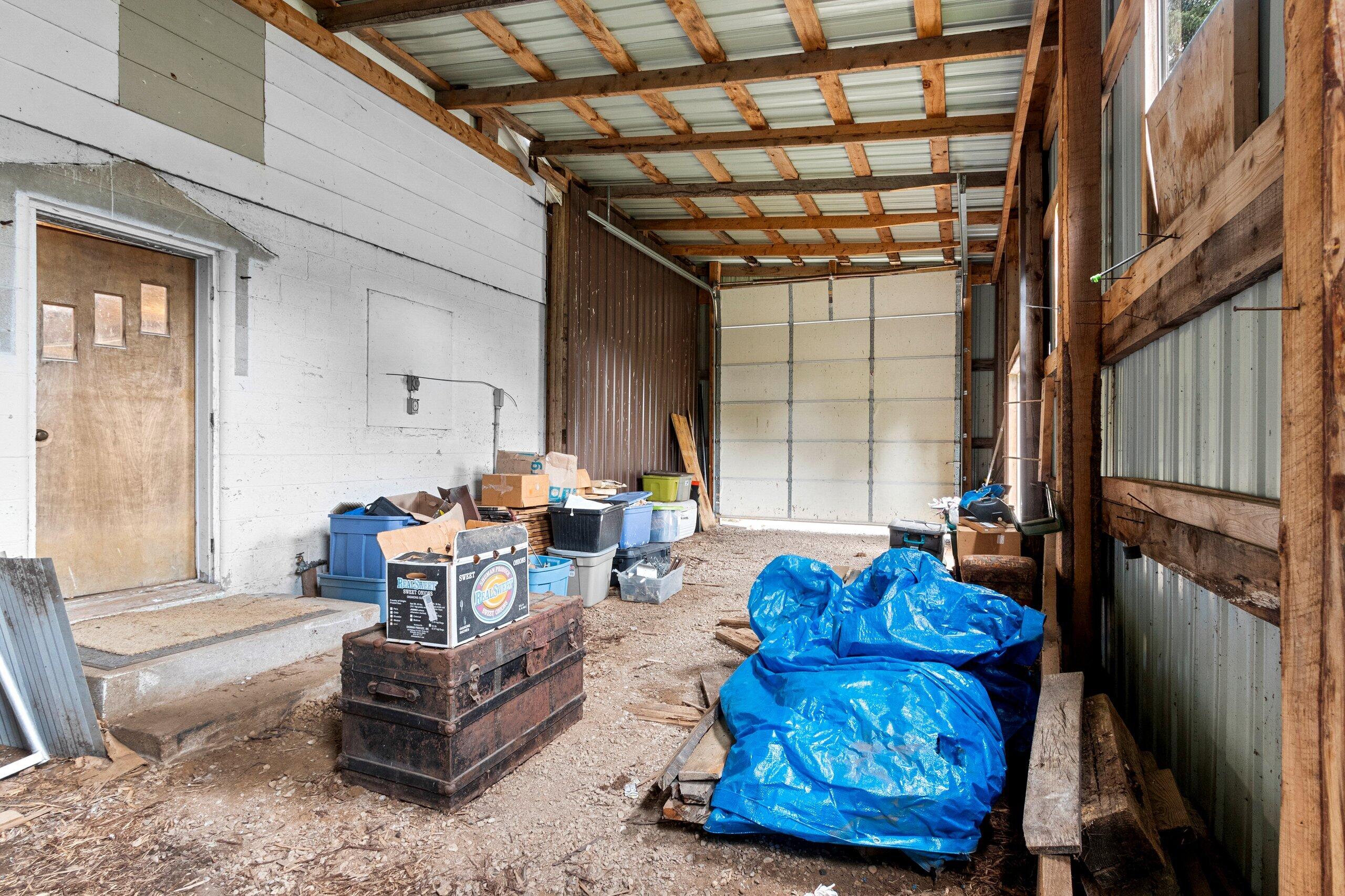 W7478 County Road 358 Daggett, MI 49821 - Photo 47 of 70 RV addition area with door to barn & exterior door