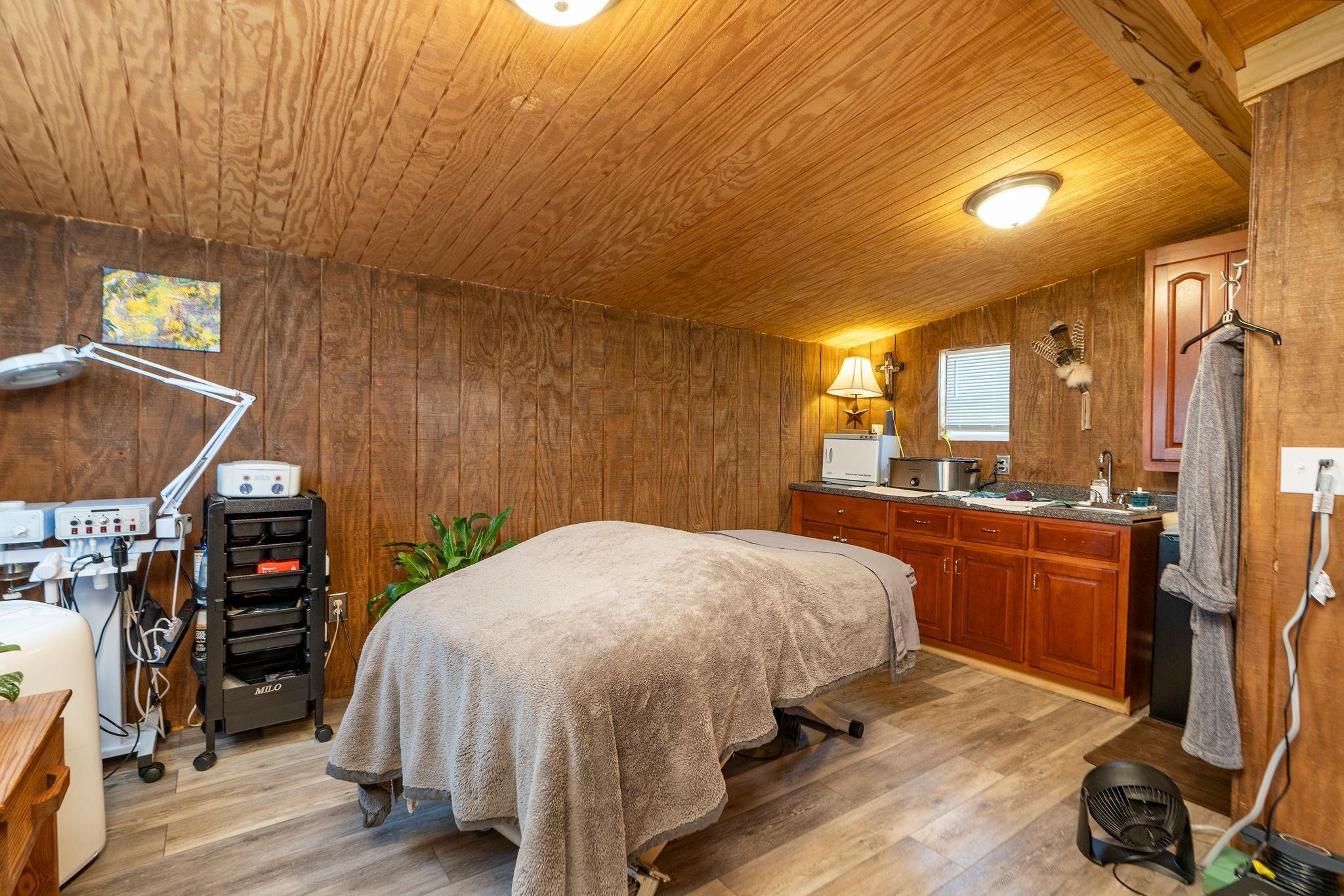 2061 Cecil Wampler Road Mount Crawford, VA 22841 - Photo 56 of 70 a bed room with a bed and a television