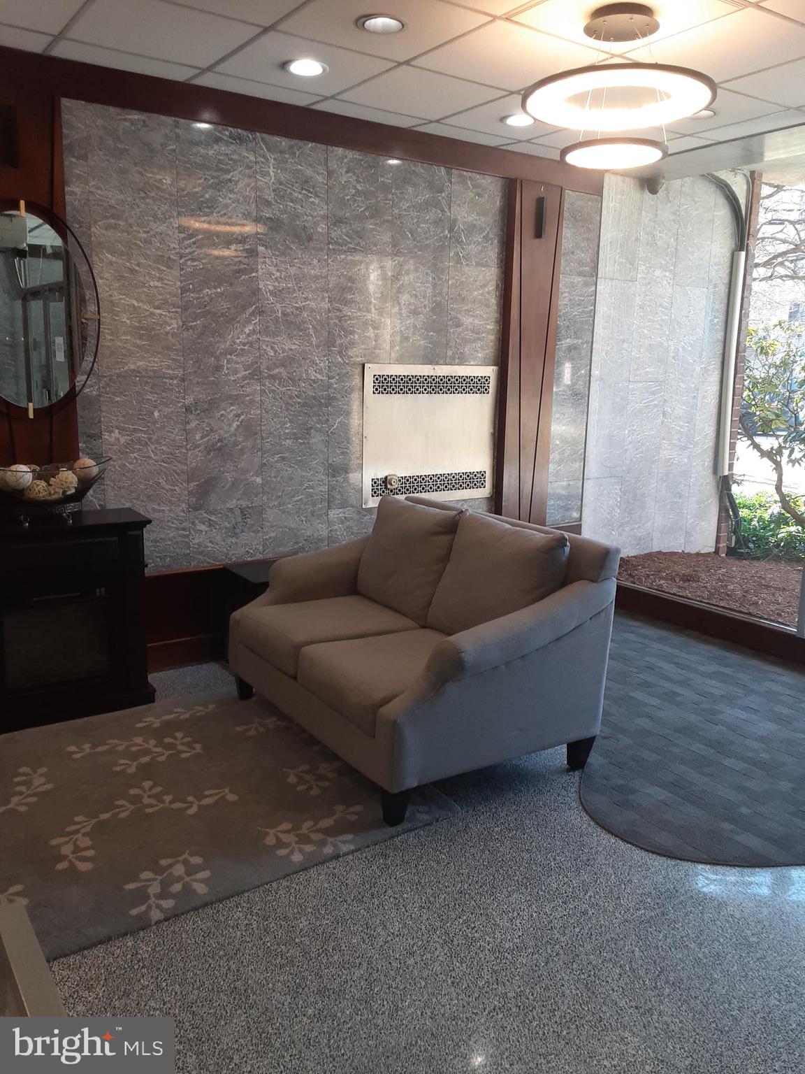 90 Prospect Avenue, Unit 4B Hackensack, NJ 07601 - Photo 5 of 29 Waiting Lobby with Security / Reception Desk