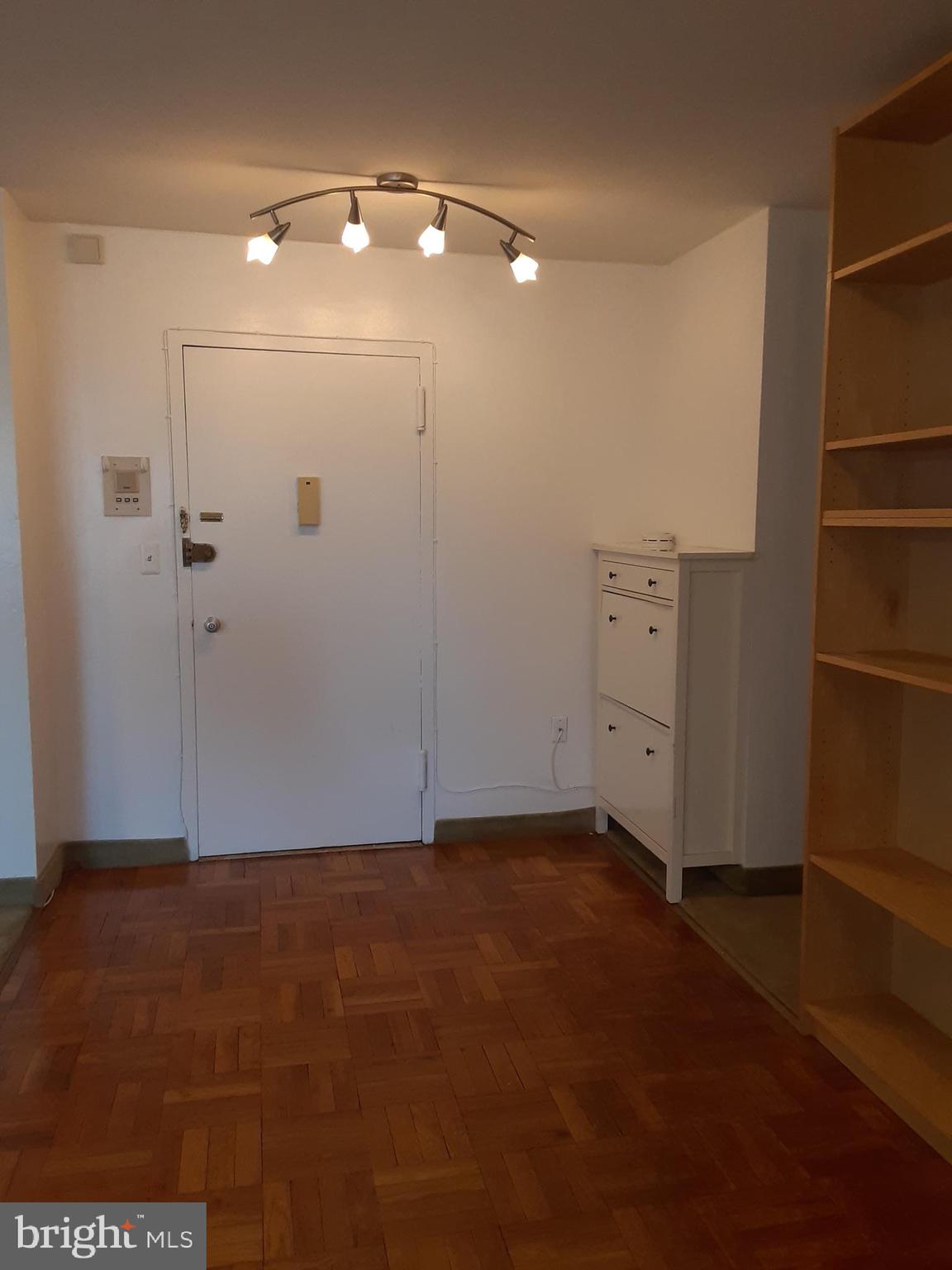 90 Prospect Avenue, Unit 4B Hackensack, NJ 07601 - Photo 9 of 29 Foyer of Apartment w/ Built-ins