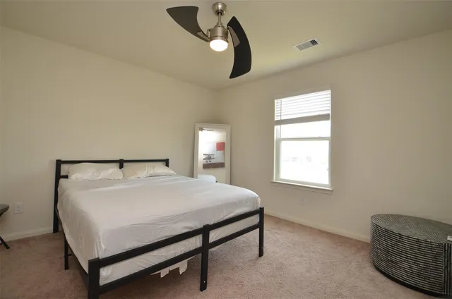 a bathroom with a sink a mirror and a shower