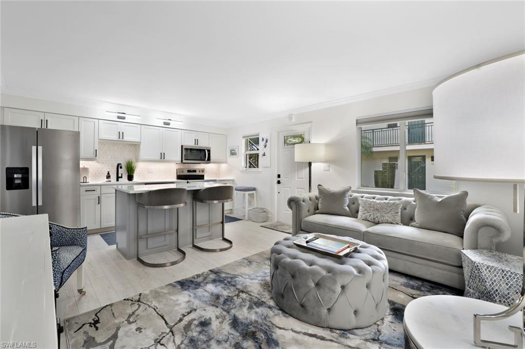 Light, bright, and completely renovated living space with an open layout for easy entertaining.