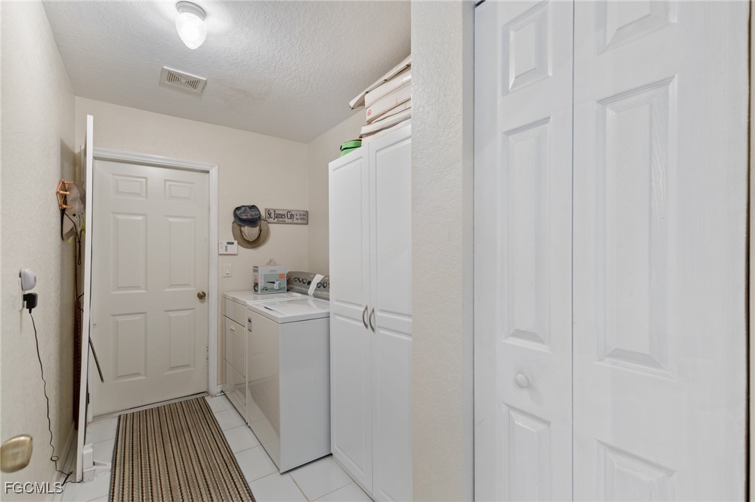 7660 Grande Pine Road Bokeelia, FL 33922 - Photo 19 of 33 a view of a hallway with closet area