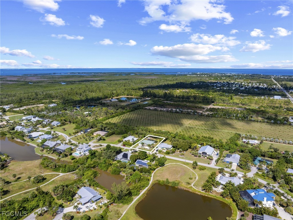 7660 Grande Pine Road Bokeelia, FL 33922 - Photo 30 of 33 a view of a city with an ocean