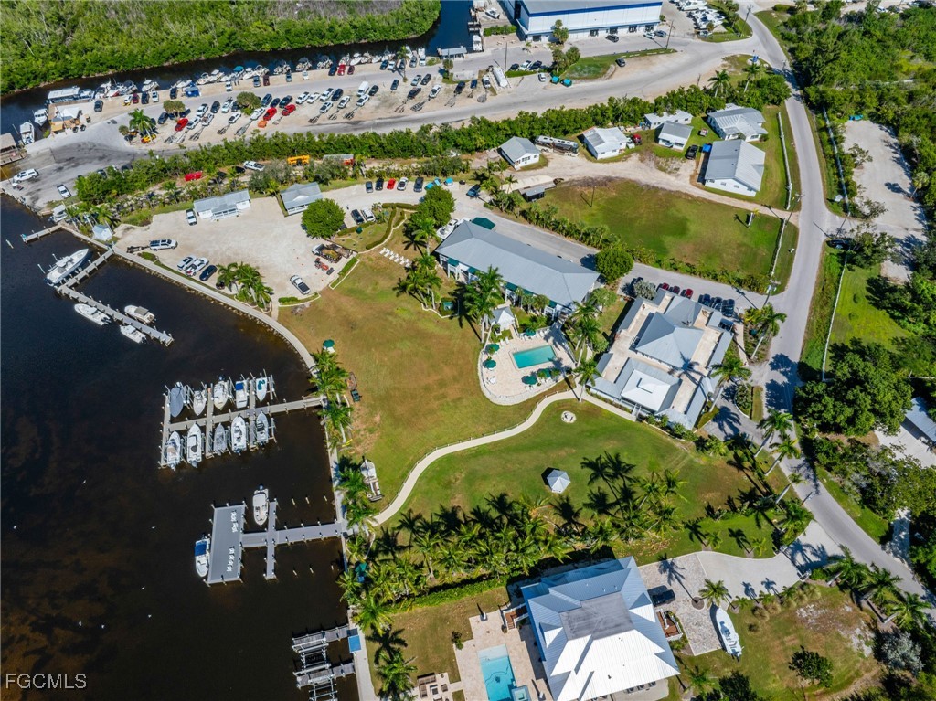 7660 Grande Pine Road Bokeelia, FL 33922 - Photo 32 of 33 an aerial view of a residential houses with outdoor space
