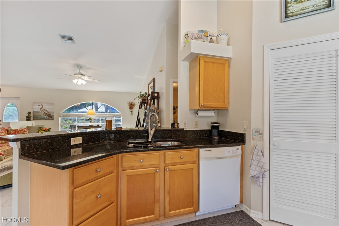 7660 Grande Pine Road Bokeelia, FL 33922 - Photo 10 of 33 a bathroom with a sink and a mirror