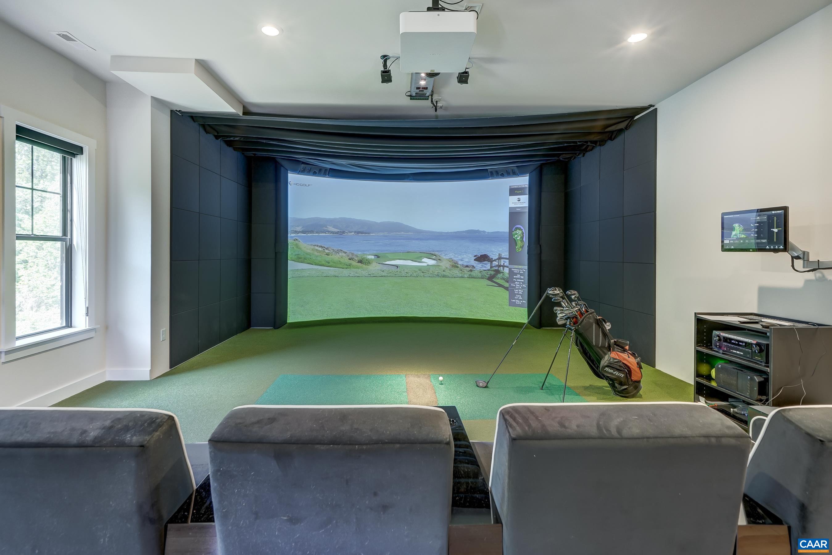 3327 Rowcross Street Crozet, VA 22932 - Photo 45 of 63 HD Golf multisport simulator and movie theater with custom seating in basement.