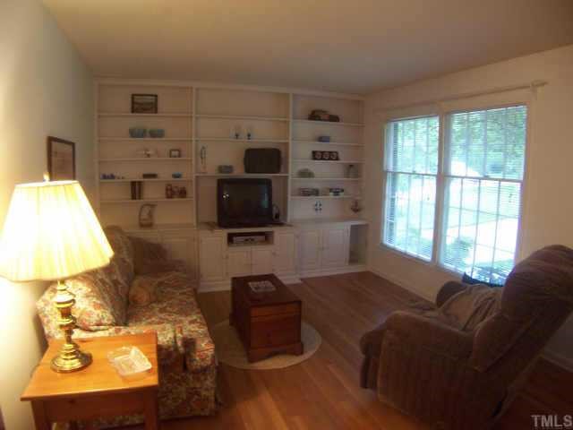 6029 Bellow Street Raleigh, NC 27609 - Photo 3 of 12 Living room with wall to wall built-ins