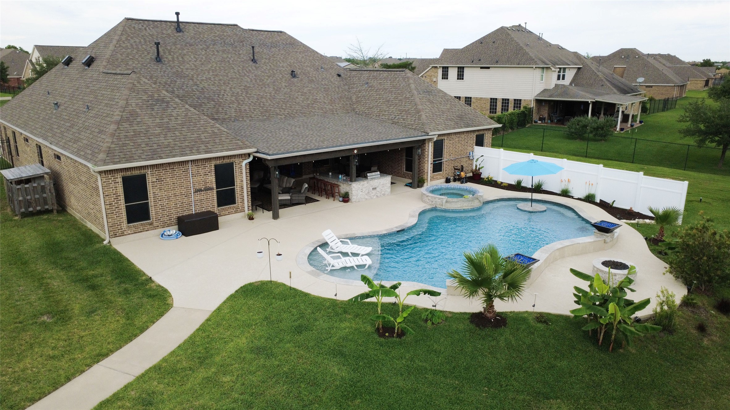 6202 Circle Back Road Baytown, TX 77523 - Photo 9 of 50 Custom pool with privacy fence