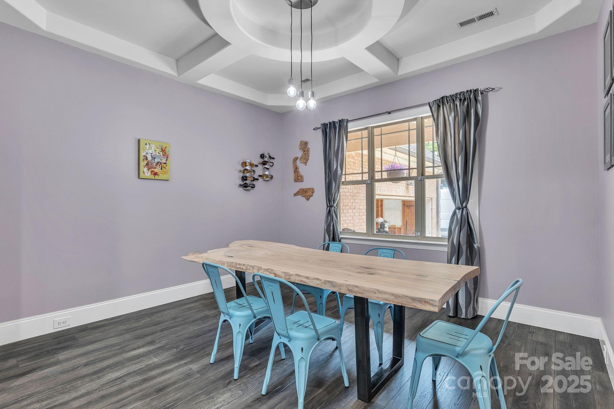 220 Alvin Hough Road Midland, NC 28107 - Photo 12 of 46 a view of a dining room with furniture window and wooden floor