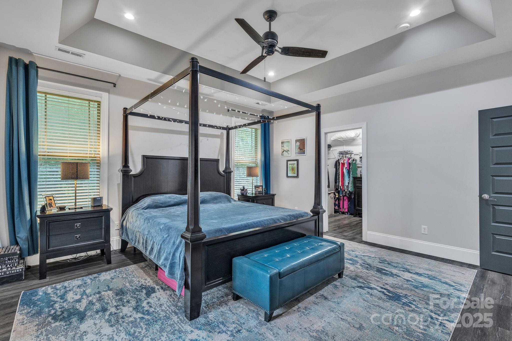 220 Alvin Hough Road Midland, NC 28107 - Photo 16 of 46 a bed room with a bed and a ceiling fan