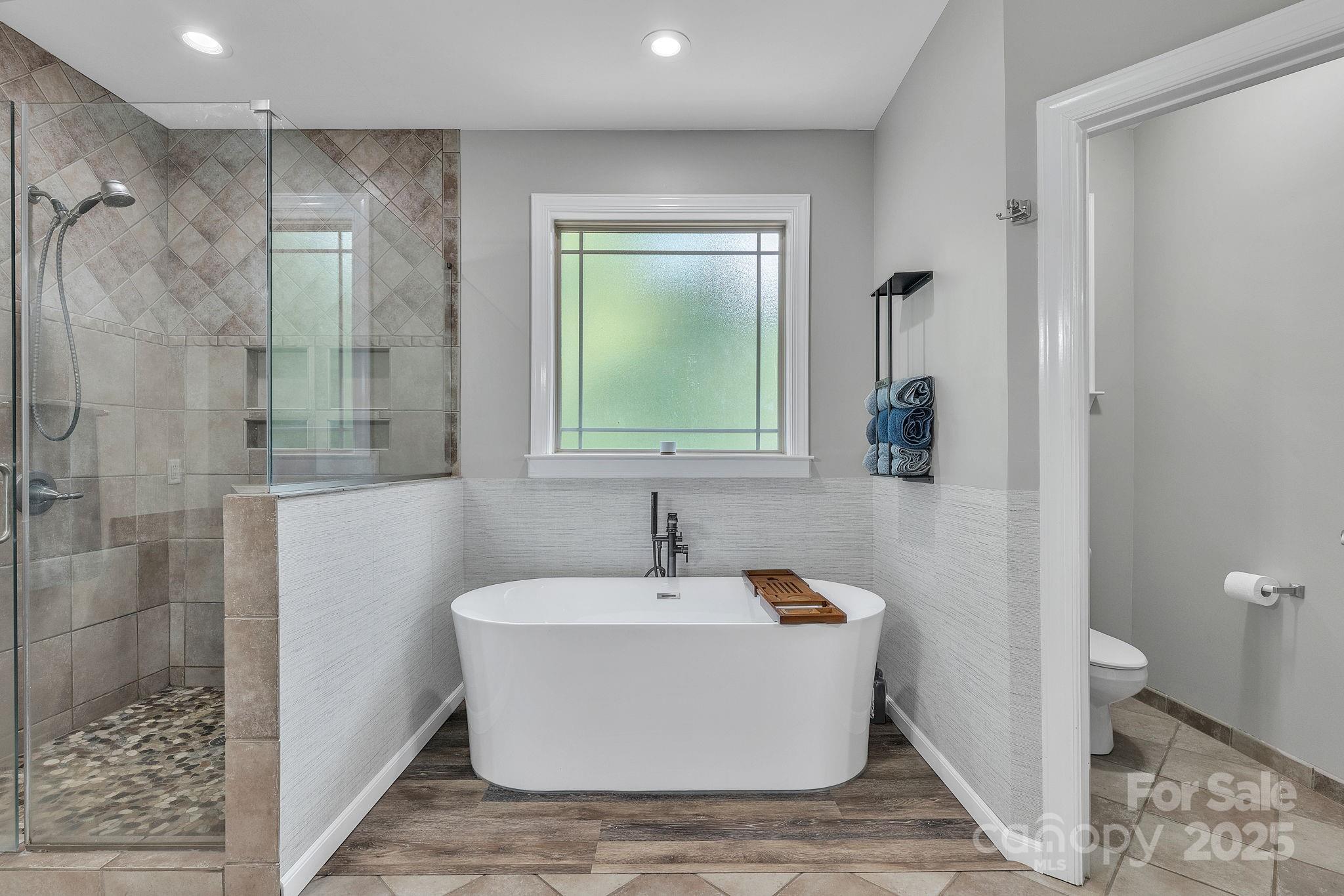 220 Alvin Hough Road Midland, NC 28107 - Photo 17 of 46 a white bath tub sitting next to a white sink