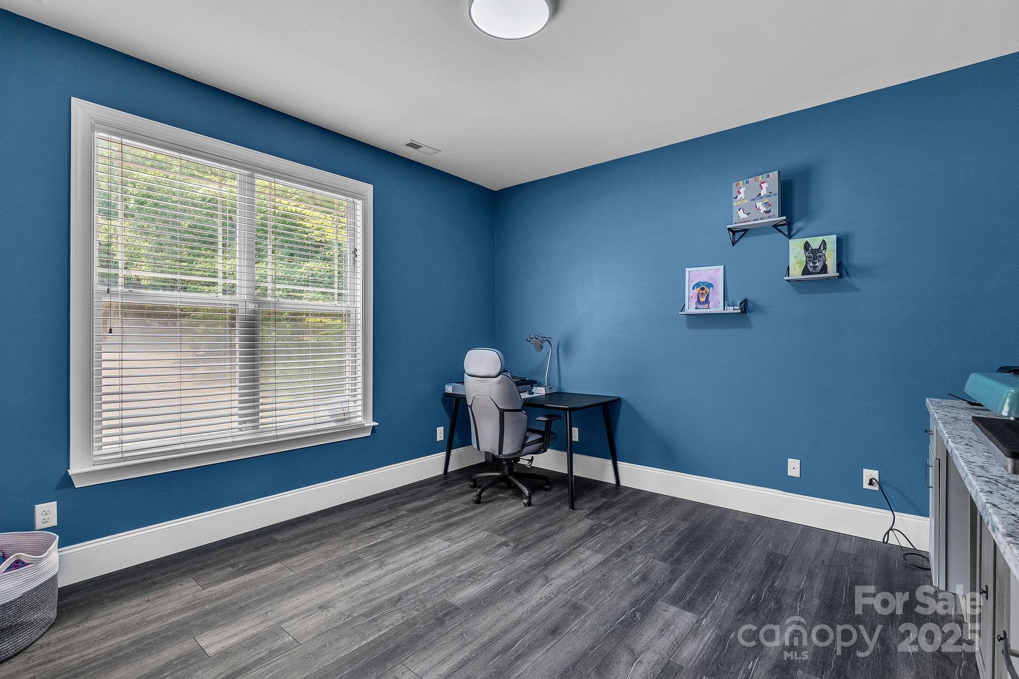 220 Alvin Hough Road Midland, NC 28107 - Photo 21 of 46 a workspace with furniture and a window