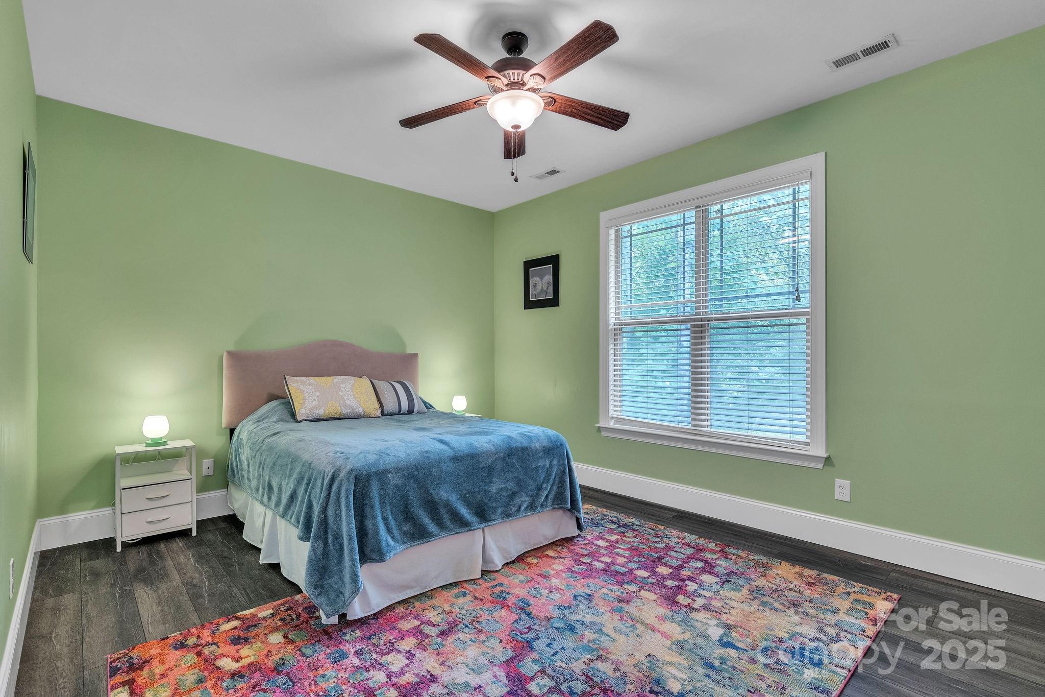 220 Alvin Hough Road Midland, NC 28107 - Photo 25 of 46 a bedroom with a bed and a window