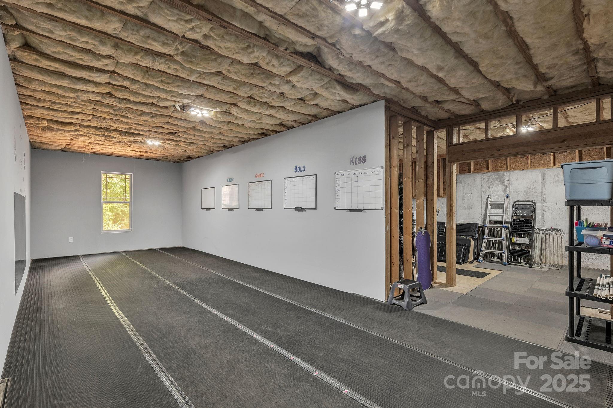 220 Alvin Hough Road Midland, NC 28107 - Photo 30 of 46 a view of a room with gym equipment