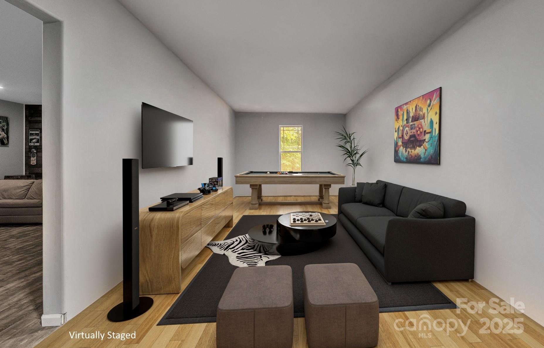 220 Alvin Hough Road Midland, NC 28107 - Photo 31 of 46 a living room with furniture and a flat screen tv