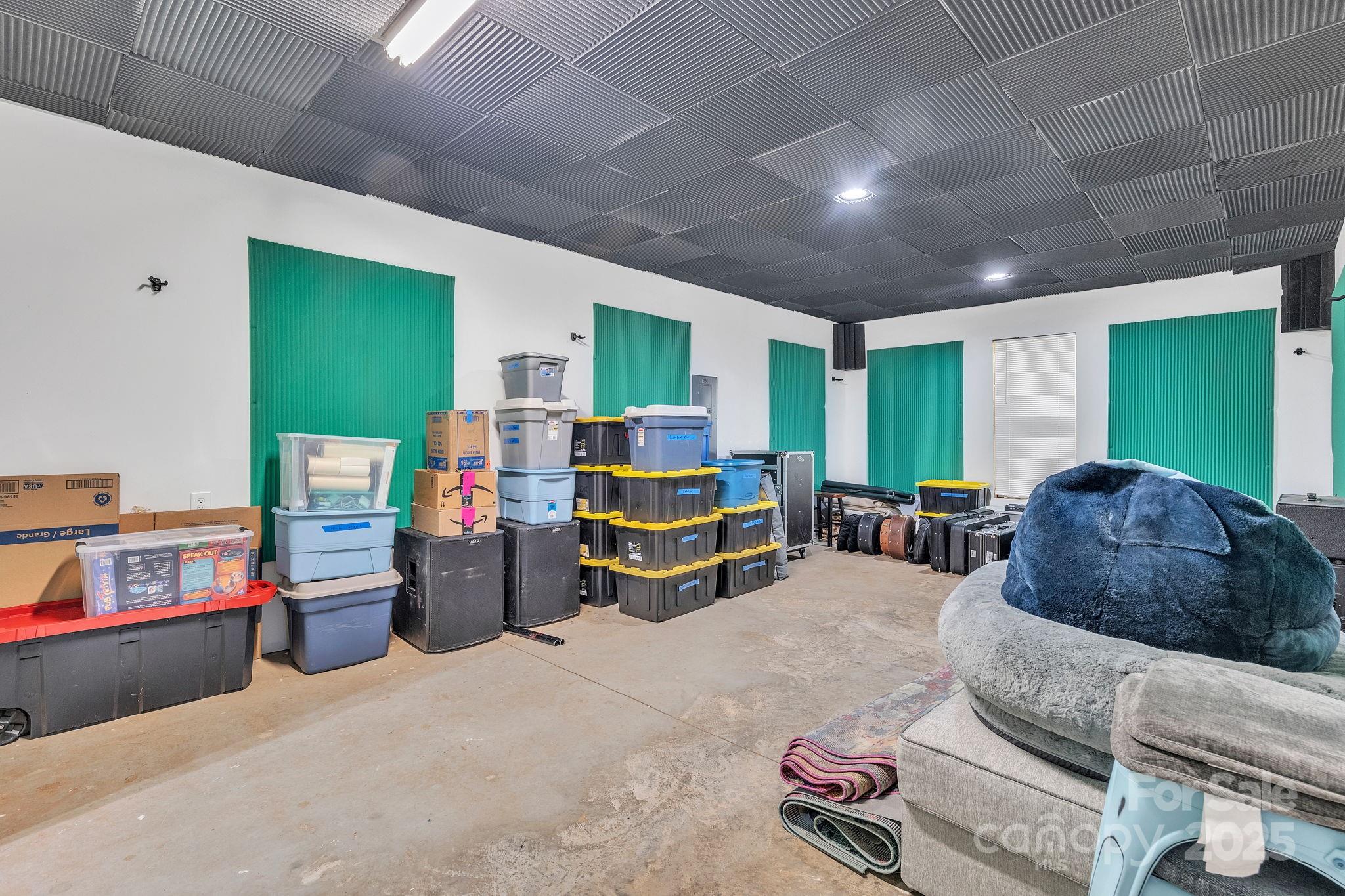 220 Alvin Hough Road Midland, NC 28107 - Photo 33 of 46 a living room with furniture and a flat screen tv
