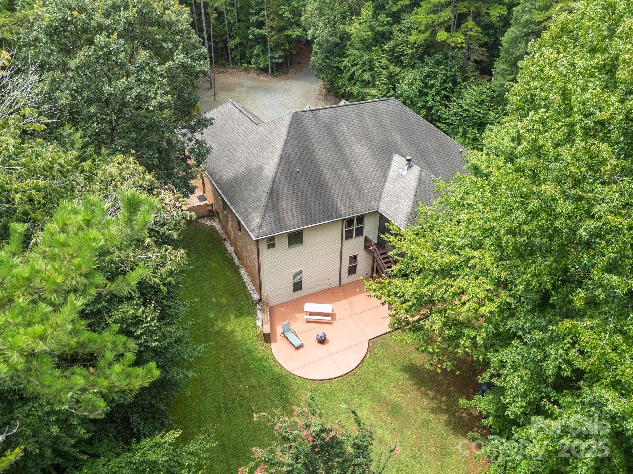 220 Alvin Hough Road Midland, NC 28107 - Photo 40 of 46 an aerial view of a house with garden space and street view