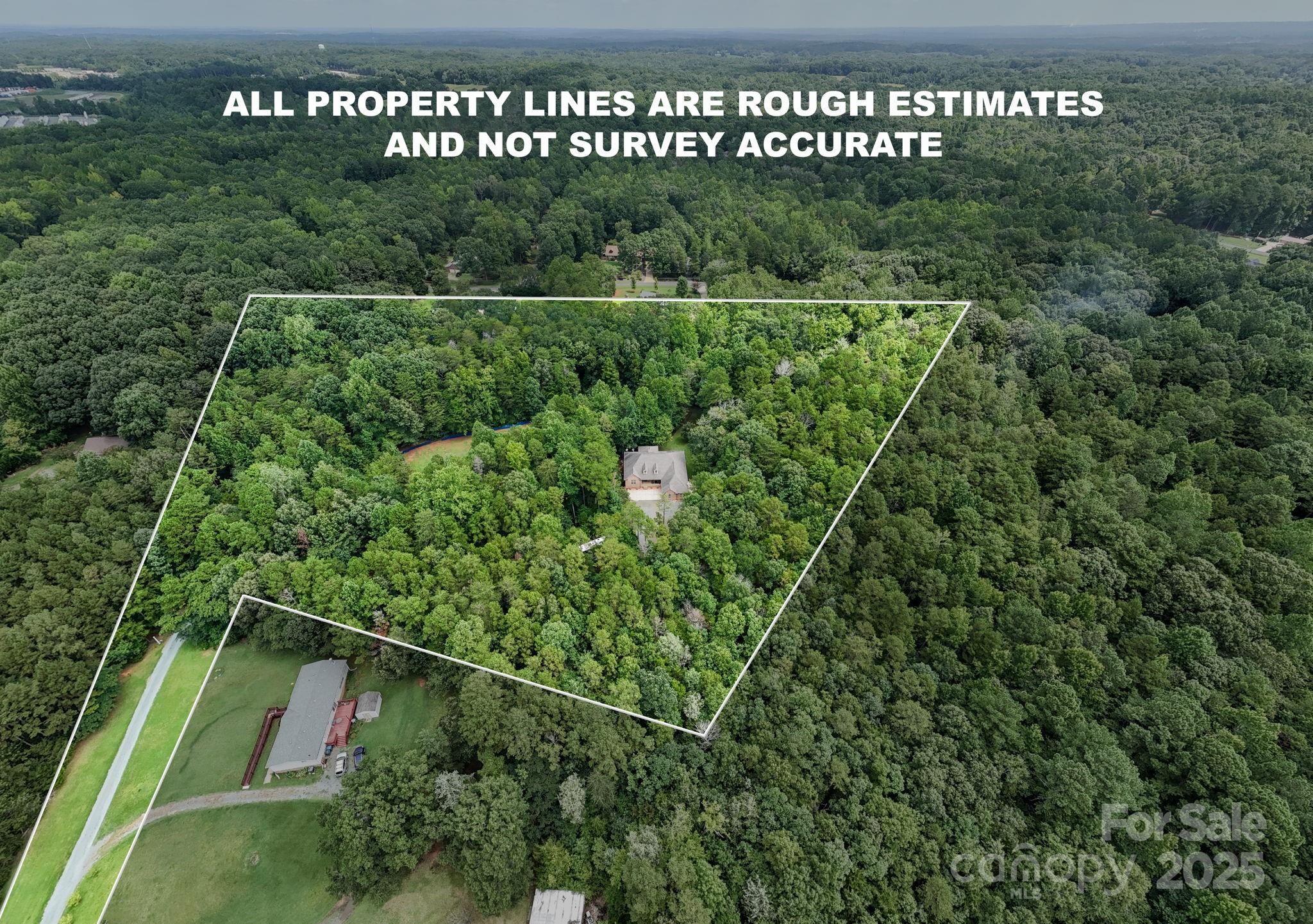 220 Alvin Hough Road Midland, NC 28107 - Photo 44 of 46 a view of a forest with a park