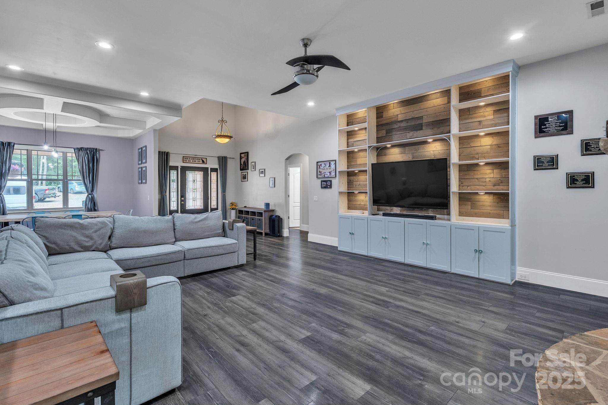 220 Alvin Hough Road Midland, NC 28107 - Photo 6 of 46 a living room with furniture and a flat screen tv