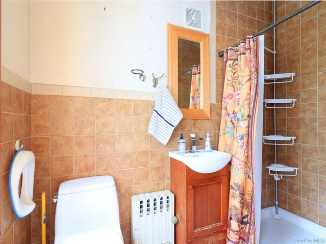 a bathroom with a sink and a shower