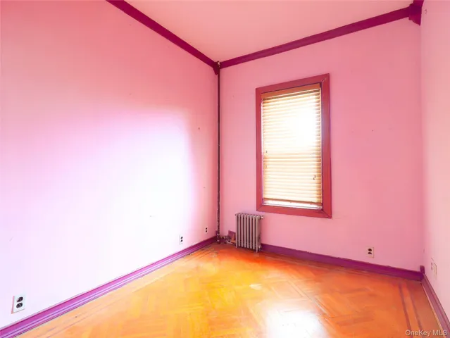 a view of a room with window and a bathroom