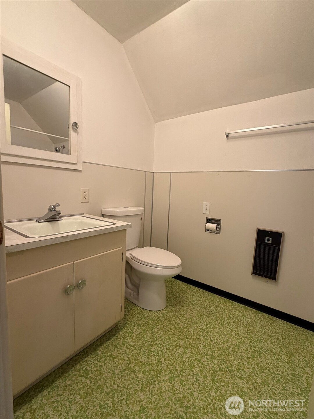 809 West Market Street Aberdeen, WA 98520 - Photo 27 of 39 a bathroom with a granite countertop sink a toilet and mirror