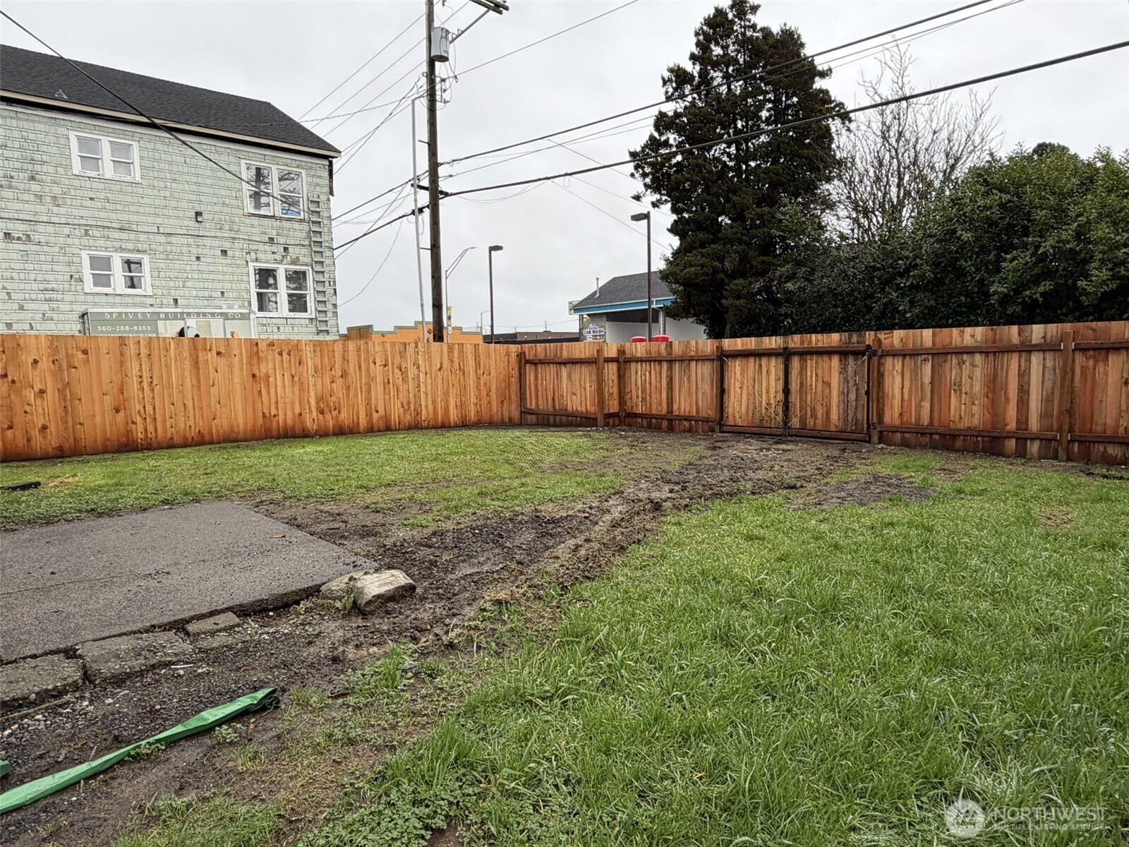 809 West Market Street Aberdeen, WA 98520 - Photo 38 of 39 a view of a backyard with wooden fence